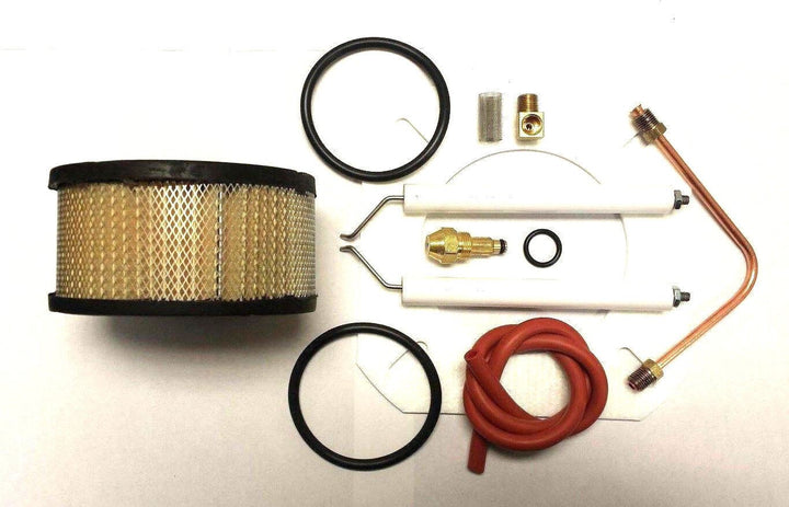 Reznor Burner Tune Up Kit consisting of 30609-8 nozzle, electrodes, air filter, oil heater o-rings (2), brass elbow, copper oil line, burner screen o-ring, burner screen, rubber hose, burner gasket, pump filter, pump gasket and oil filter.